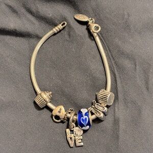 Brighton bracelet and charms.Just been cleaned at jewelry store. Beautiful set.